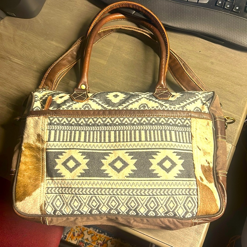 Myra messenger bag cow hair on hide detail